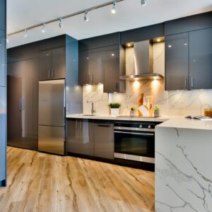 Modern kitchen with custom marble countertops and a marble island