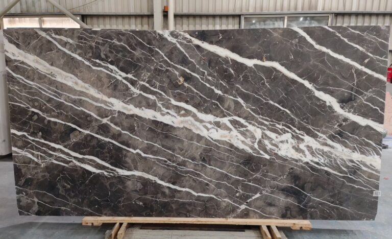 Dallas Grey marble slab with grey-brown tones and diagonal white veins